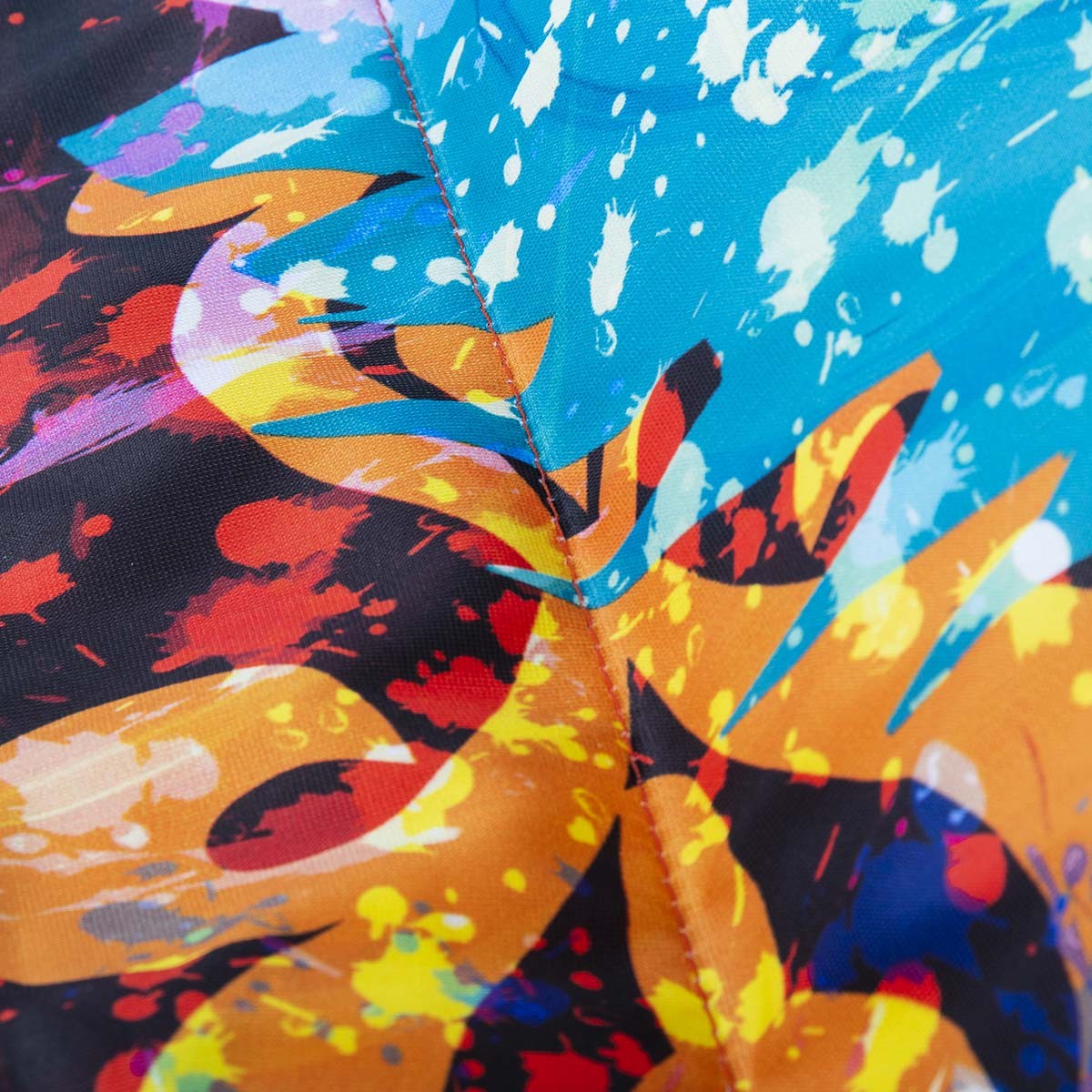 Pouf Géant ART52® - Ange : zoom tissu imprimé haute qualité, œuvre colorée Benjamin Cupillard, série limitée signée
