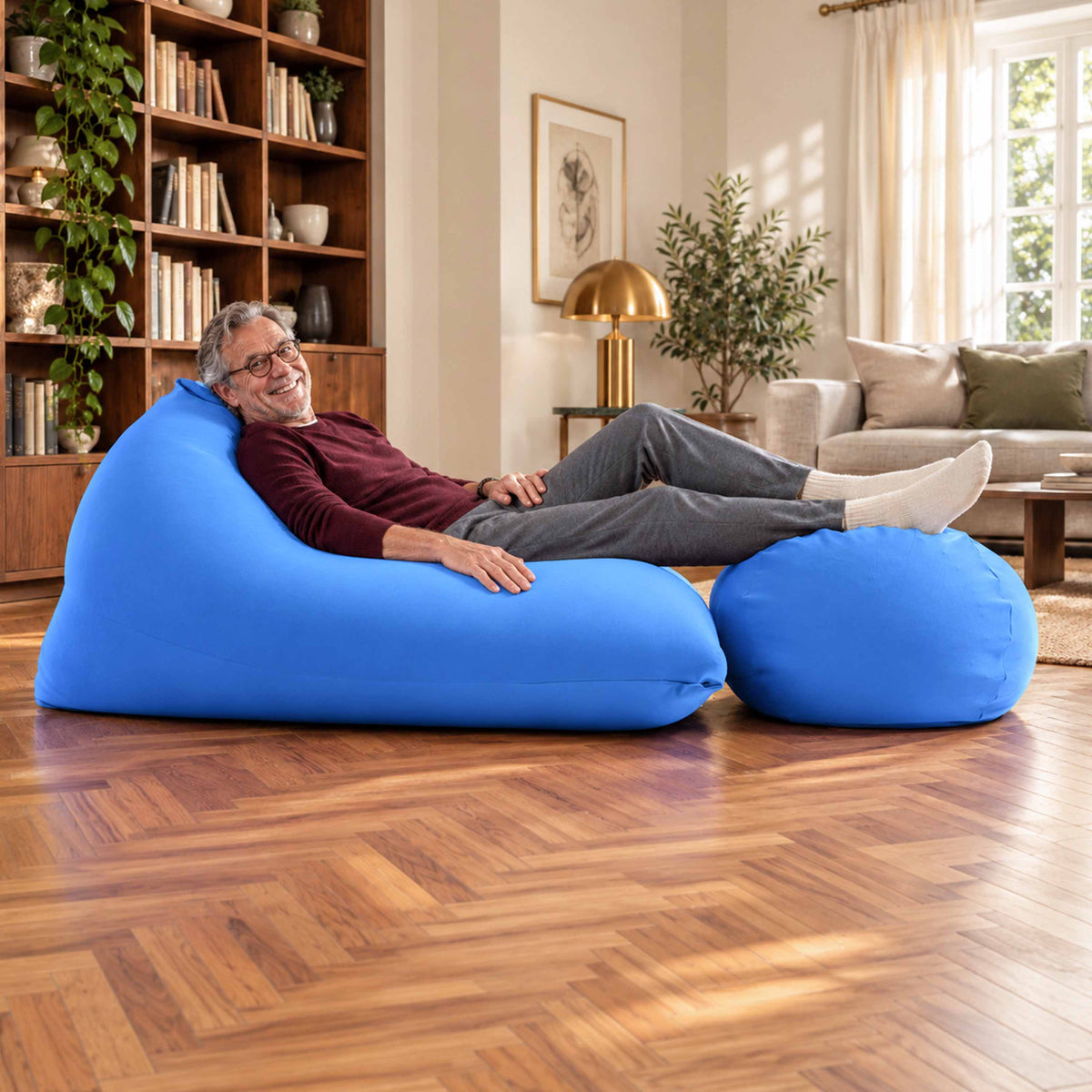 pouf repose-pieds bleu stretch d’intérieur en forme de tube BiG52, pouf de détente bleu pour salon et chambre