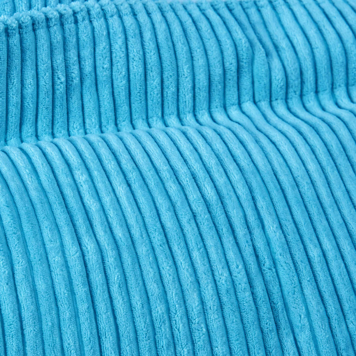 Pouf Velours Côtelé Bleu Ciel en velours côtelé bleu ciel, gros plan de la texture