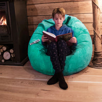 Samt Cord Pouf Birnenform Türkis