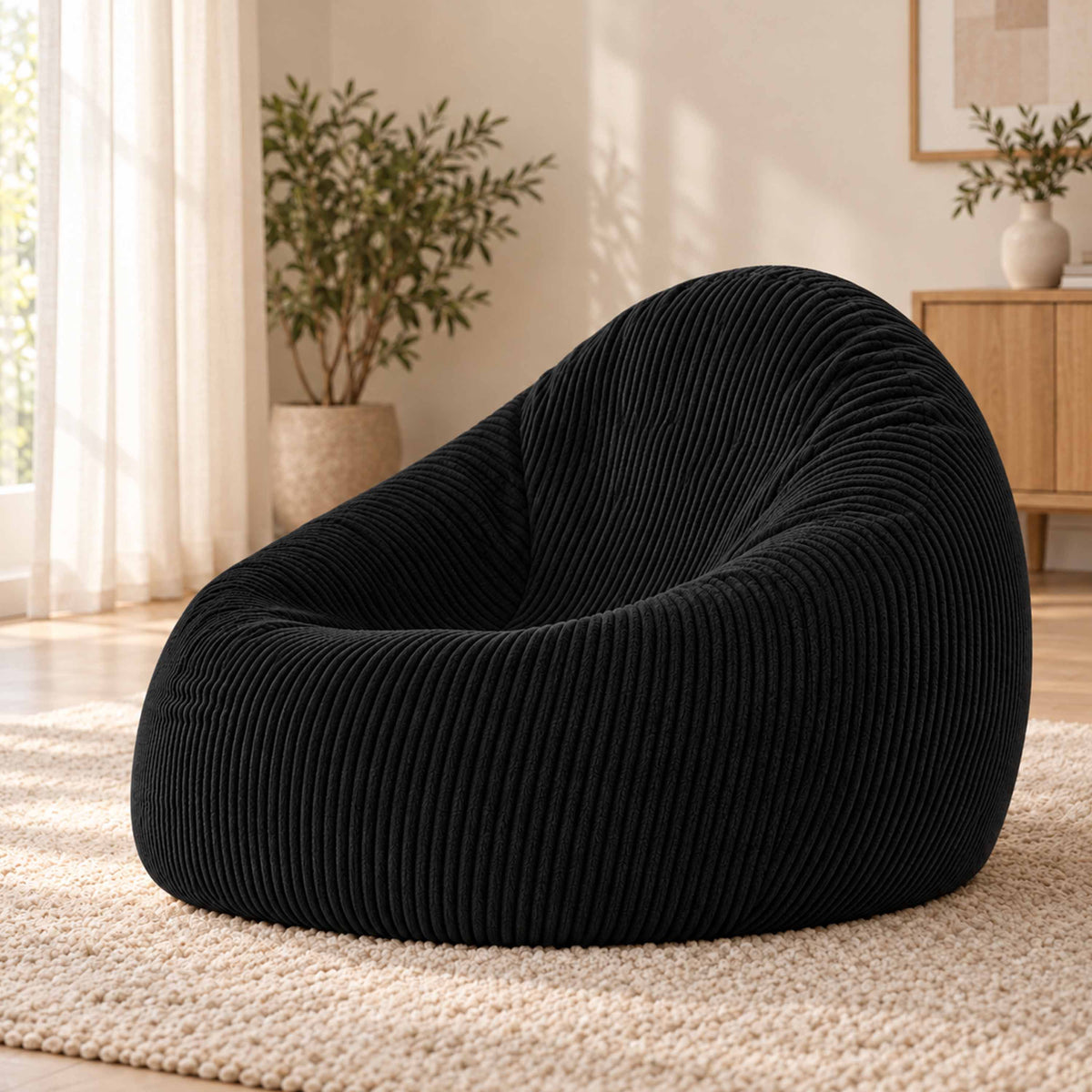 Pouf Poire Velours Côtelé Noir, assise déco en velours côtelé noir déhoussable, confort ergonomique pour salon